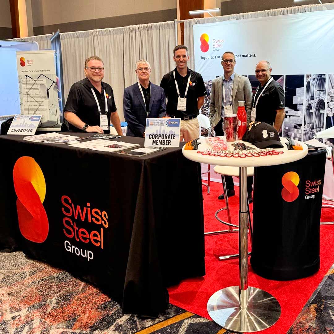 Engineer Daniele Magistroni of Bonomi Acciai with the Swiss Steel Group team (Steven Smith, John Stocker, Daniel Frie, Mike Pellicane) at the NADCA 2025 trade show booth, an international event on die casting.