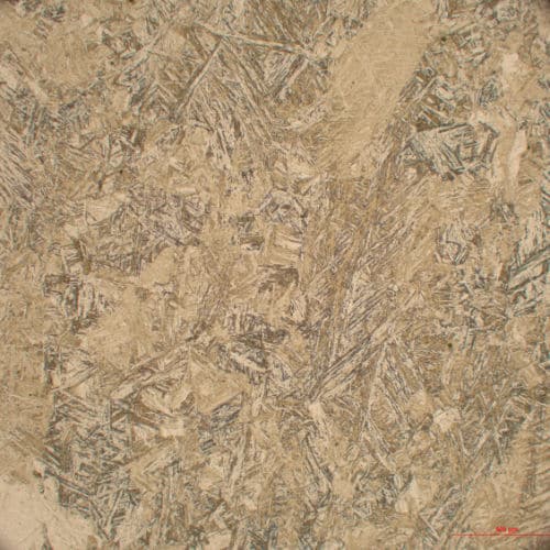 Microstructure of solution-annealed steel observed under a microscope to assess homogeneity, chromium carbides and corrosion resistance.